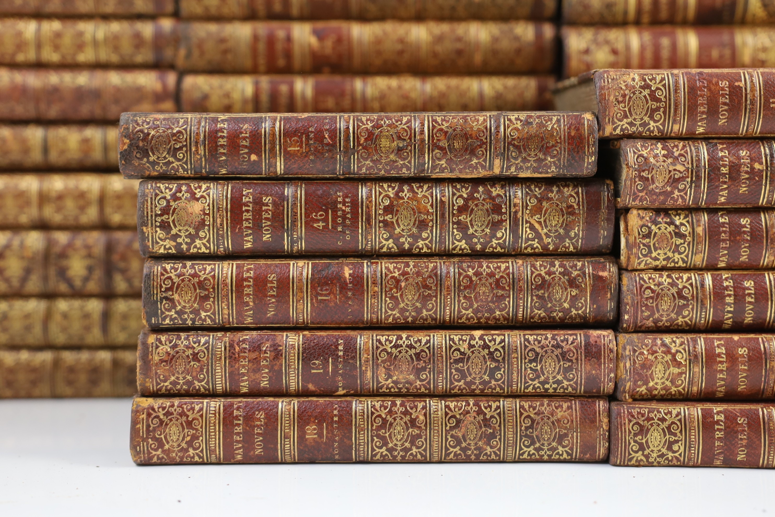 Scott, Sir Walker - Waverley Novels, 48 vols., engraved pictorial and printed titles, frontispieces; contemp. gilt-decorated maroon half morocco and marbled boards with panelled spines, marbled edges and e/ps., sm.8vo. E